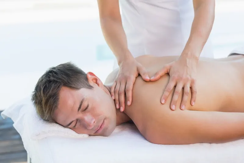A full back massage in progress